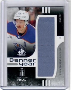 2024-25 SP Juego Usado Ryan Nugent-Hopkins Stanley Cup Banner Año Banner Tarjeta - Imagen 1 de 2