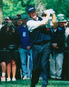 NICK FALDO 8X10 PHOTO GOLF PICTURE WATCHING FLIGHT PGA - Picture 1 of 1