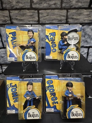 Juego completo de figuras de acción de dibujos animados McFarlane Toys 2004 The Beatles Foto 1 de 4