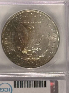 1884 O Morgan Silver Dollar MS64 IGC Sunset Orange Toning - Picture 1 of 3