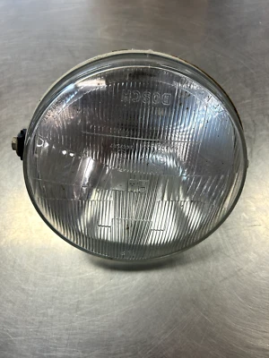 OEM BMW K100 RS LUZ DELANTERA CON BOMBILLA BOSCH 34475R20 ALGO DE SUCIEDAD INTERIOR Foto 1 de 4