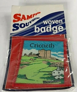 Parche de recuerdo vintage Criccieth insignia borde rojo en paquete original 7x5 cm  - Imagen 1 de 4