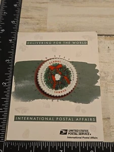 Prendedor de solapa global de asuntos de oficina de correos del Servicio Postal de los Estados Unidos Q4 - Imagen 1 de 2