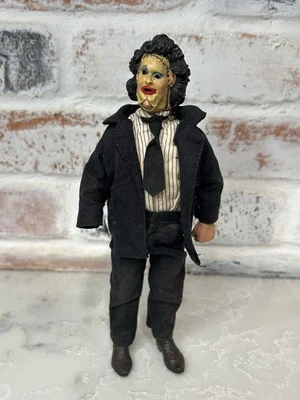 FIGURA VESTIDA CON CARA DE CUERO MASACRE MOTOSIERRA NECA TEXAS Foto 1 de 4