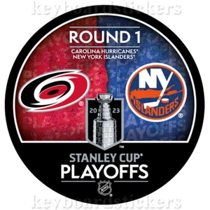 2023 Stanley Cup Playoffs Dueling Puck Carolina Hurricanes vs New York Islanders - Picture 1 of 2