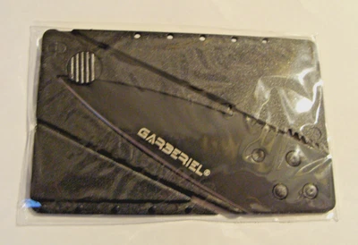 NEAT NEW IN PACKAGE RAZOR SHARP GARBERIEL DEFENSE / HANDY WALLET FOLDING KNIFE - Image 1 of 3