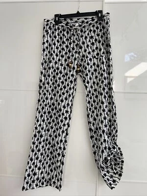 Pantalones de playa Diane Von Furstenberg talla M con bolsillos blancos con patrón de palmeras Foto 1 de 4