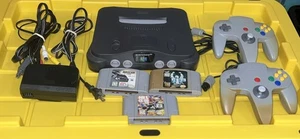 Pacchetto console Nintendo 64 N64 completo di 2 controller ufficiali 3 giochi - Foto 1 di 12