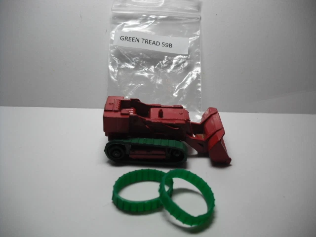 ¡NUEVAS BANDAS DE RODADURA! Matchbox #58B EXCAVADORA DE TROZOS VERDE PELDAÑOS DE REPUESTO UN PAR Foto 1 de 1