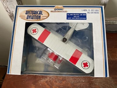 Model Power Die-Cast  1/48 Army Red Cross Biplane With Skis Travel Air 4000 - Image 1 of 4