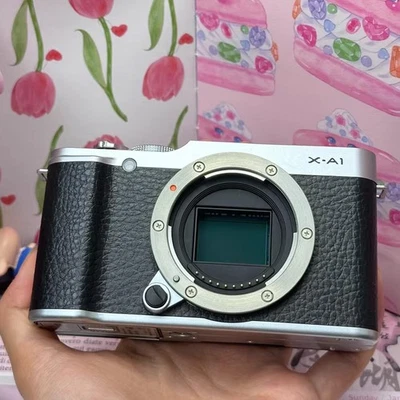 Cámara digital Fujifilm X-A1 16,3 MP sin espejo cuerpo plateado -90 % nueva Foto 1 de 4