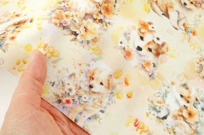 Bonita tela con patrón de flores y cachorros bebé perro hecha en Corea por media yarda Foto 1 de 4