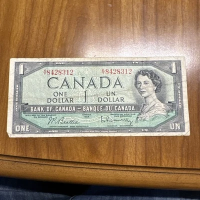 1954 Канадский один доллар дьявола лицо банкнота 1 $ Банк Канады - Изображение 1 из 2