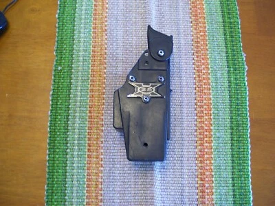 Blade-Tech Taser X26 Black Polymer Holster w/ Tek Lok Attachment Right Hand - Image 1 of 4