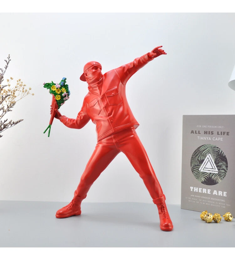 涂鸦艺术家班克斯红花飞行员陶瓷艺术雕塑雕像模型 — 第 1/1 张图片