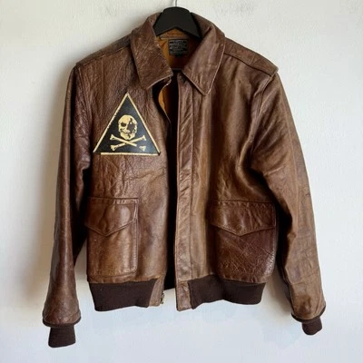 Original WWII A-2 Flight Jacket Patched Bombardment Jolly Roger - Image 1 of 4