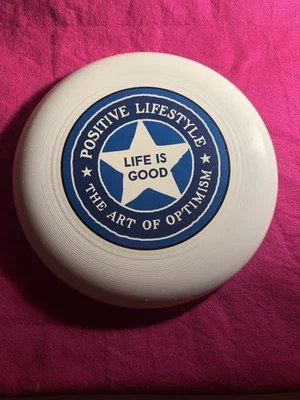 Disco deportivo profesional Life Is Good Frisbee DisCraft Inc. hecho en Estados Unidos. Foto 1 de 4