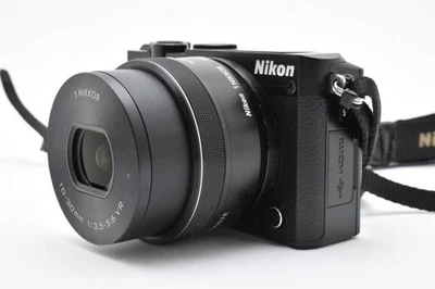 Nikon 1 J5 Mirrorless Camera 10-30mm VR PD-Zoom Lens Kit with Battery Strap - Image 1 of 4