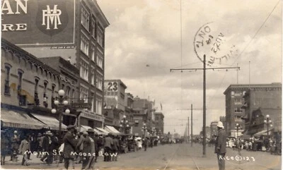 MooseJaw SK Real Photo postcard by "Rice"  Mailed at MooseJaw 1914 Busy card - Image 1 of 2