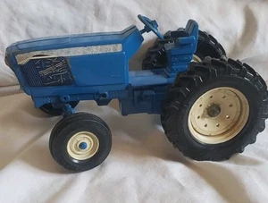 Volante coleccionable Ford ERTL 9" metal azul tractor granja juguete años 60 de colección - Imagen 1 de 15