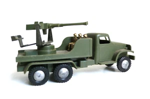POLITOYS NR. 15 LKW GMC - FLUGABWEHRKANONE 60ER JAHRE GUTER ZUSTAND KUNSTSTOFF - Bild 1 von 6