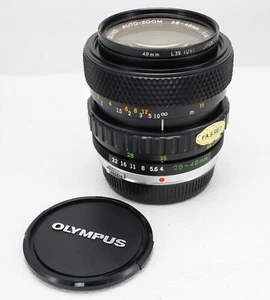 Olympus OM Zuiko Auto-Zoom 28-48mm f/4 Objektiv + OM UV Filter & Original Caps - Bild 1 von 11