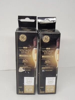 GE Vintage CAM E26 Filament LED Bulb, Transparent Amber 2 pack - Image 1 of 2