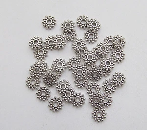 40pz perline metallo fiore spacer separatori 9mm colore argento tibet - Foto 1 di 1