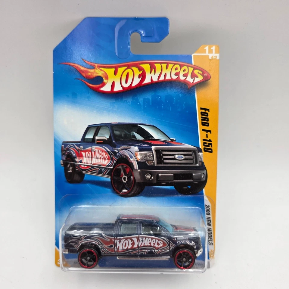 Hot Wheels Ford F-150 2009 Diecast Truck New Models Blue Red Graphics Carded - Image 1 of 4