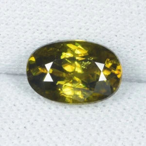1.71 SPARKLING FINE BROWN YELLOW SPARKLING NATURAL SPHENE Oval See Vdo C4 - Picture 1 of 2