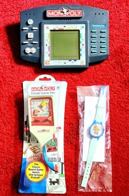 3 Vintage Monopoly: Electronic Hand Held Video Game, Pinball Pen and Watch Lot - Image 1 of 4