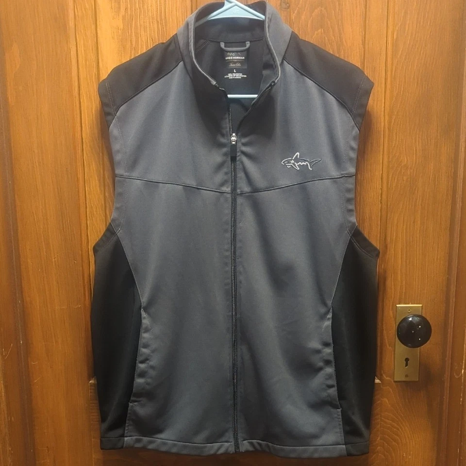 Chaleco de golf Greg Norman For Tasso Elba para hombre talla Lg gris/negro Foto 1 de 4