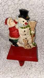 Ein Kind macht einen Schneemann Gusseisen Sockel Strumpf Aufhänger Halter Haken - Bild 1 von 2