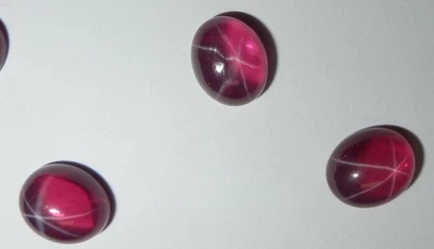 Transparent Star Ruby Oval 10x8 mm Cabochon 6 Rayed Lab-created Stone 3 pcs Lot - Image 1 of 4