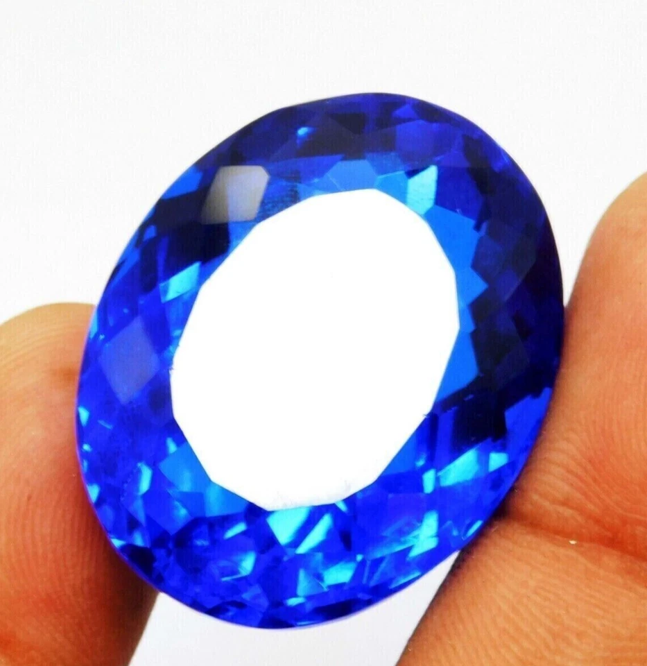 AAA+ Blue Tanzanite 98.10 Ct. Oval Faceted Cut Loose Gemstone for Birthday Gifts - Image 1 of 4