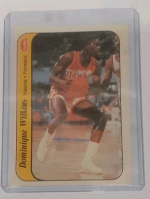 Dominique Wilkins 1986-87 Fleer #11 Atlanta Hawks RC Sticker - Image 1 of 3