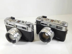 PAR DE CÁMARAS YASHICA ELECTRO 35 GSN VINTAGE S PARA PIEZAS O REPARACIÓN - Imagen 1 de 11