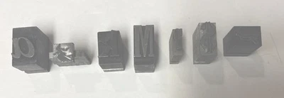 7 Separate Letterpress Lead Type Blocks: a, Witch, k, M, ? Mark,Crown/cross, $ - Image 1 of 4
