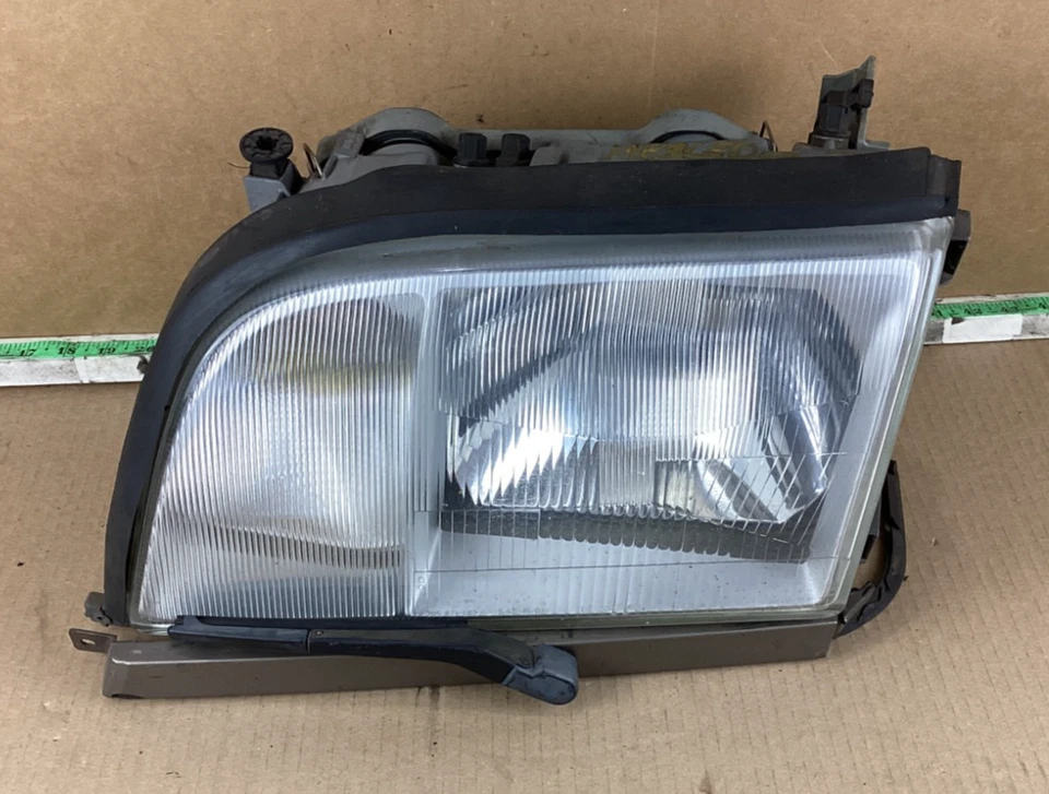 Faro delantero izquierdo del conductor Mercedes-Benz 500SEL 1992-1993 1408206561 OEM Foto 1 de 4