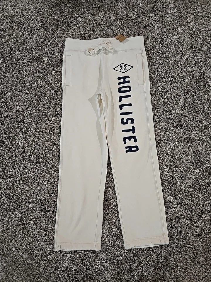 Pantalones deportivos rectos clásicos Hollister nuevos con etiquetas para hombre talla XS ropa de salón crema Foto 1 de 4