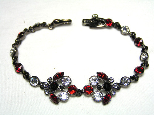 ...GIVENCHY...Bracciale Cristalli Trasparenti Tono Argento Scuro Nero Rosso...