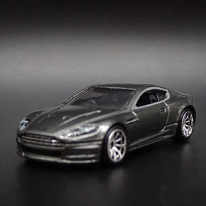2008-2012 Aston Martin Dbs 007 Casinò Royale Grigio 1/64 Scala Modellino Auto - Foto 1 di 7