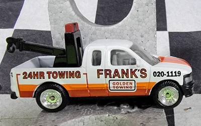 Vintage Golden Wheel Diecast 1/64 Frank’s 24 Towing Pickup Truck - Image 1 of 4