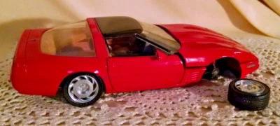 CORVETTE ZR-1 TESTORS CAR RED BLACK MODEL 7104 BEIGE INT 1:24 DIE CAST TIRE OFF. - Image 1 of 4