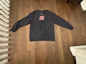 Men's Black New Jersey Devils Splatter Logo Long Sleeve T-Shirt - Picture 1 of 2