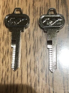Nos Ford Keys (pair) uncut Pinto logo - Picture 1 of 2