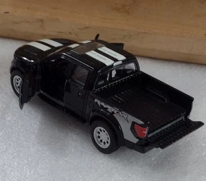 Druckguss Ford F150 Raptor Super Crew 2013 schwarz weiße Streifen Kinsmart   - Bild 1 von 5