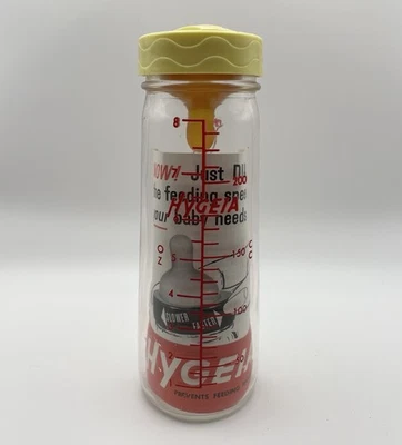 Antiguo biberón vintage de vidrio Hygeia Anderson Dairy con tapa e instrucciones Foto 1 de 4