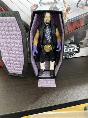 WWE JAKKS CLASSIC SUPERSTARS THE UNDERTAKER COLLECTOR SERIES WITH CASKET - Image 1 of 4