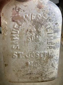 Dal New Mexico - fiaschetta di whisky Samuel Westheimer & Son-St Joseph MO - scavata, in rilievo - Foto 1 di 7